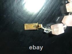 Antique 14 karat gold pendant rose quartz, and 19 square chunks of rose quartz