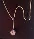 Rodney Raynor amethyst and diamond rose quartz python pendant with chain