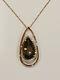 Solid 9ct rose gold diamond and smoky quartz pendant and chain necklace