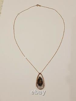 Solid 9ct rose gold diamond and smoky quartz pendant and chain necklace