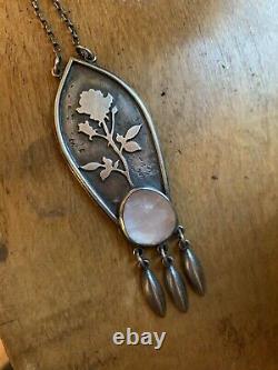 The noisy plume late bloomer rose quartz necklace