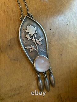 The noisy plume late bloomer rose quartz necklace